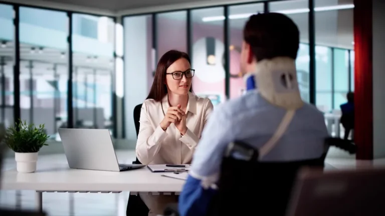 Man is consulting with lawyer after construction Injuries